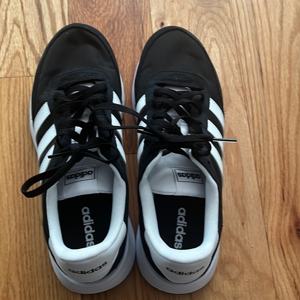 Adidas black material sneakers white stripes size 9.5 never worn!